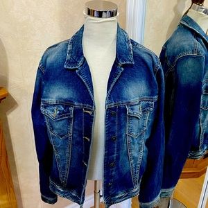 Silver Jean jacket, has stretch to it